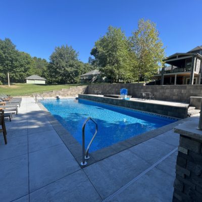 A well maintained backyard swimming pool in Iowa.